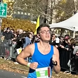 William running a marathon.